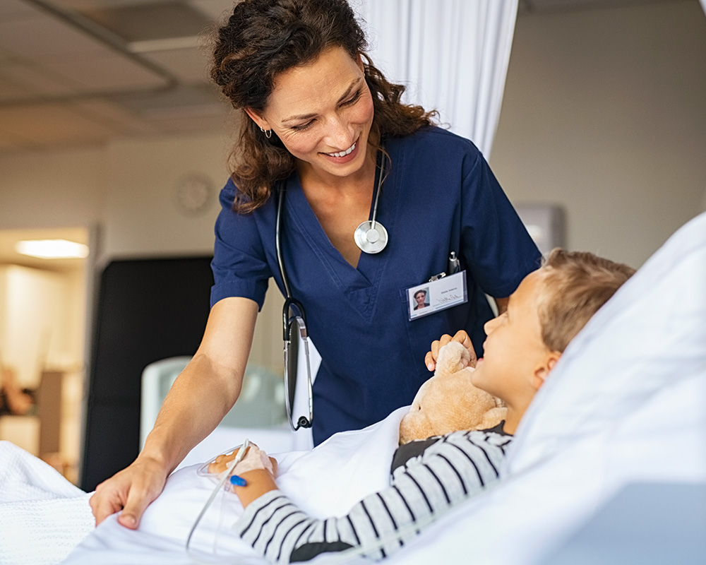 An Advanced Practice Provider caring for a patient and happy in her role